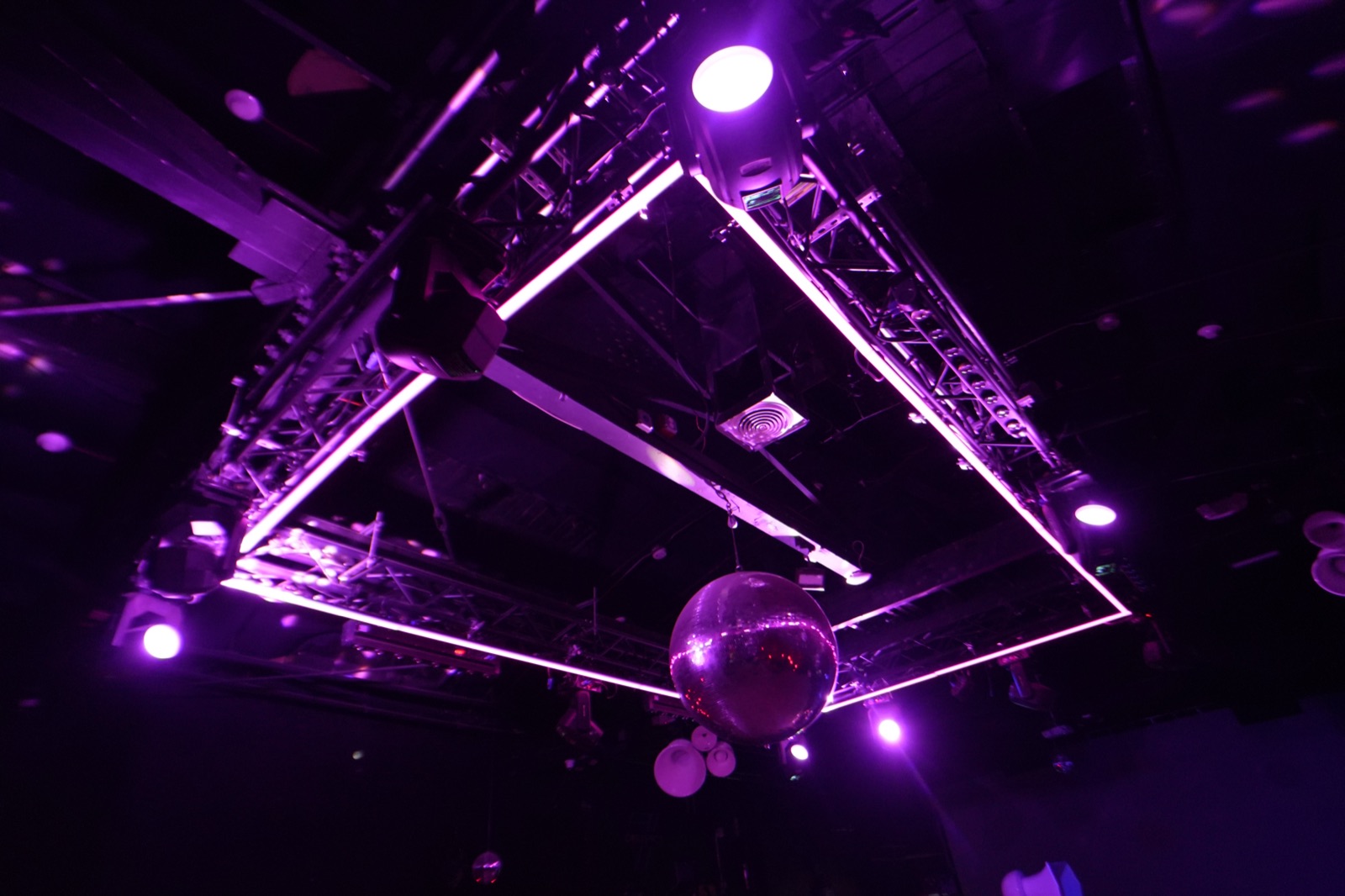 Disco ball and lighting truss over the dance floor